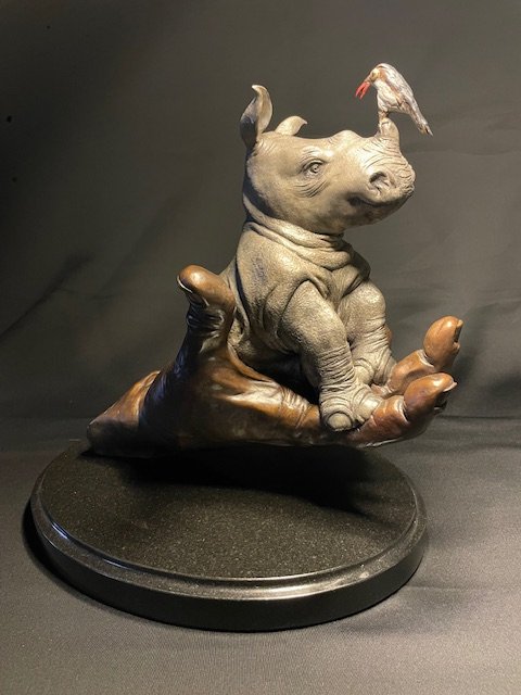 Buddy - bronze baby rhino sculpture by J. A. Pippett.